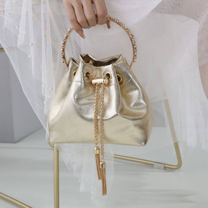 10161 crystal handle clutch bag